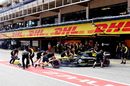 Nico Hulkenberg returns to the pits after breaking his front wing