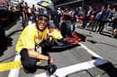 Neymar poses for a photo with the Red Bull RB15 on the grid