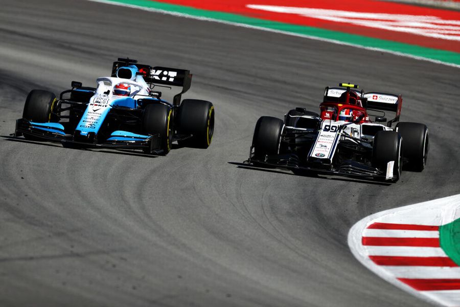 George Russell and Antonio Giovinazzi battle for position