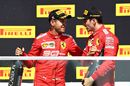 Sebastian Vettel and Charles Leclerc celebrate on the podium