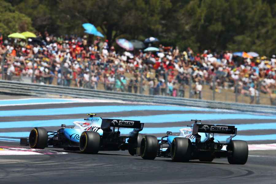 Robert Kubica leads George Russell on track in the Williams