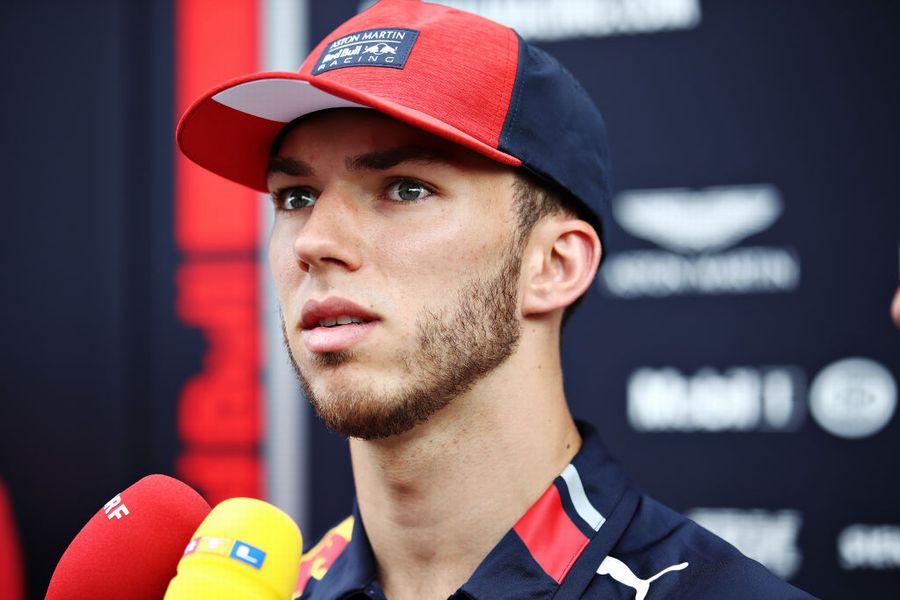 Pierre Gasly talks to the media