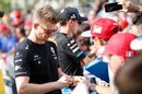 Nico Huelkenberg signs autographs for fans in the Paddock