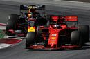 Sebastian Vettel and Max Verstappen battle for position