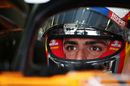 Carlos Sainz Jr looks on from the McLaren cockpit