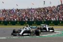 Valtteri Bottas leads Lewis Hamilton on track in the Mercedes