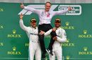 Race winner Lewis Hamilton and Valtteri Bottas celebrate on the podium