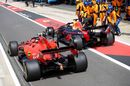 Charles Leclerc  Max Verstappen  battle for position in the pit lane