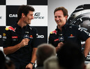Mark Webber and Christian Horner share a joke at a Red Bull press conference