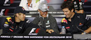 Sebastian Vettel, Michael Schumacher and Mark Webber share a joke