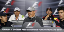 Michael Schumacher fields questions during a press conference