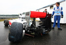 The wreckage of Lewis Hamilton's McLaren during free practice 1