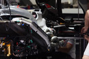 Work continues on Lewis Hamilton's car after his accident
