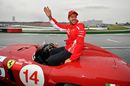 Sebastian Vettel waves to crowd on the drivers parade