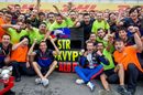 Alex Albon and Daniil Kvyat celebrate with the team