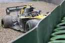 Nico Hulkenberg is sitting in his destroyed racing car after a crash