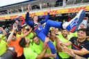 Daniil Kvyat celebrates with his team