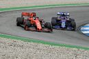 Sebastian Vettel overtakes Daniil Kvyat