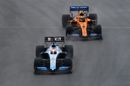 George Russell and Lando Norris battle for position