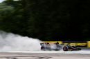 Romain Grosjean kicks up dust on track in the Haas