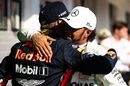 Race winner Lewis Hamilton and Max Verstappen celebrate in parc ferme