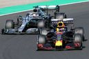Max Verstappen and Lewis Hamilton battle for position