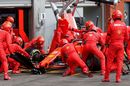 Sebastian Vettel makes a pit stop for new tyres