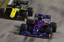 Daniil Kvyat and Daniel Ricciardo battle for position