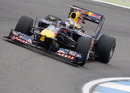 Sebastian Vettel searches for the apex on intermediate tyres