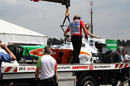 Tonio Liuzzi's wreck is lifted away