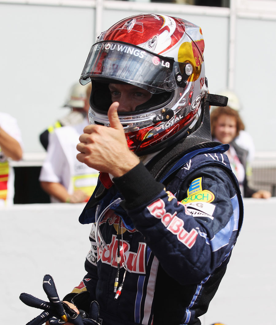 Sebastian Vettel gives the thumbs up after securing pole