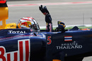 Sebastian Vettel waves to his home fans after taking pole position