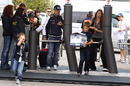Rubens Barrichello arrives at the circuit with his family