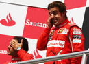 The contrasting emotions of Felipe Massa and Fernando Alonso is clear to see on the podium