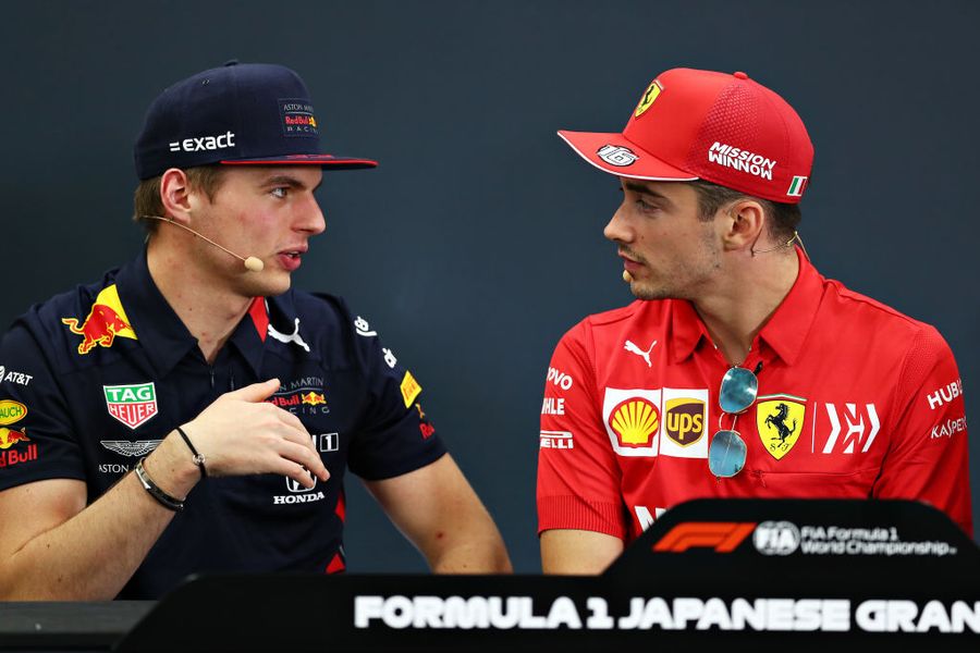 Max Verstappen and Charles Leclerc talk in the Press Conference