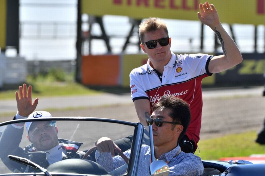 Kimi Raikkonen and Valtteri Bottas on the drivers parade