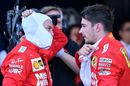 Sebastian Vettel speaks with Charles Leclerc in parc ferme after the race
