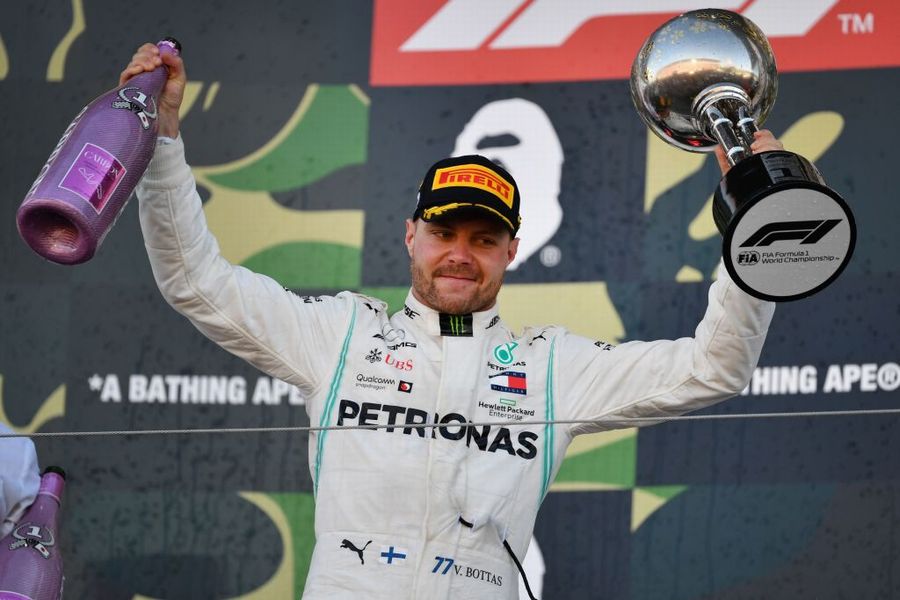 Race winner Valtteri Bottas celebrate on the podium