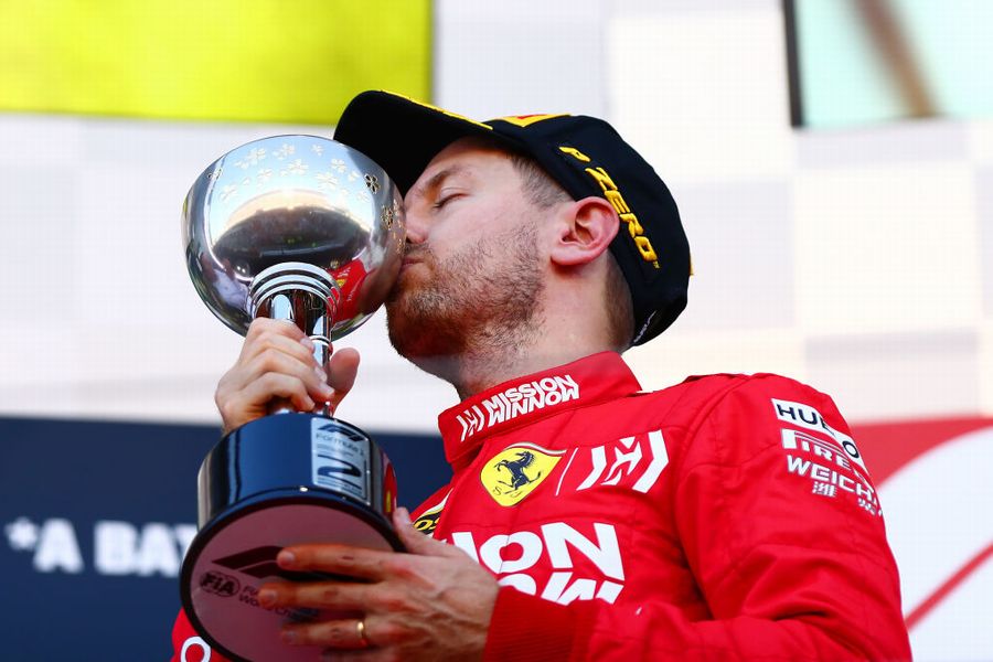 Sebastian Vettel celebrate on the podium