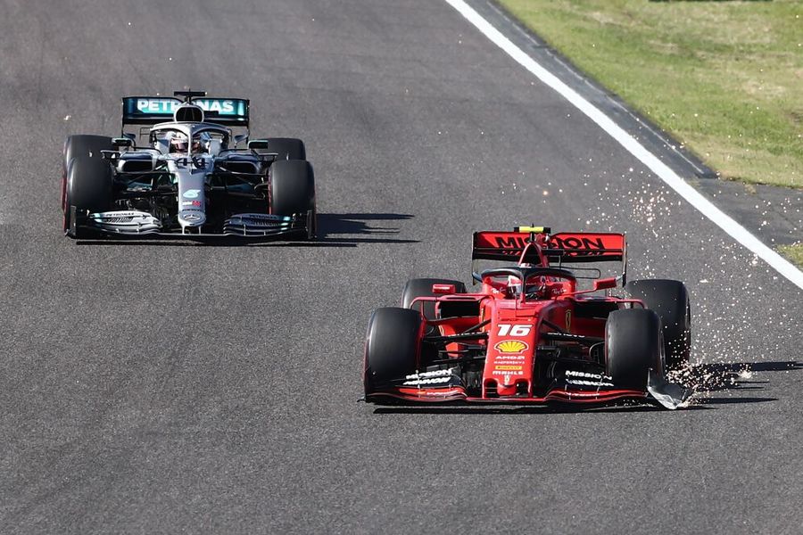 Charles Leclerc leads Lewis Hamilton on track