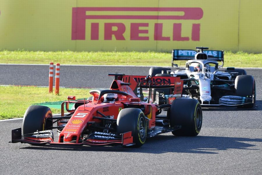 Sebastian Vettel and Lewis Hamilton battle for position