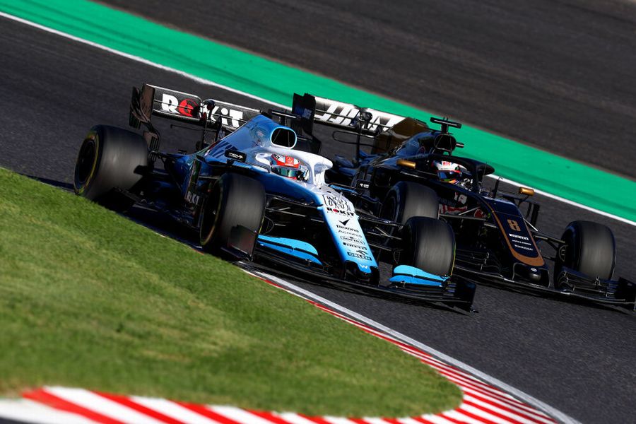 George Russell and Romain Grosjean battle for position