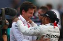 Race winner Lewis Hamilton celebrates with Toto Wolff in parc ferme