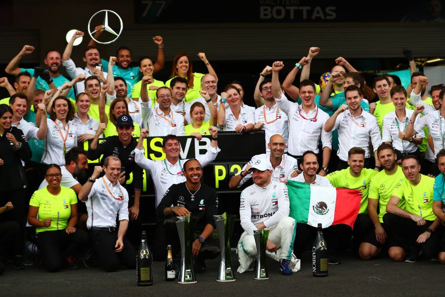 Race winner Lewis Hamilton and Valtteri Bottas celebrate with their team