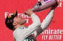 Race winner Valtteri Bottas celebrate on the podium with the champagne