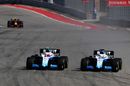 George Russell and Robert Kubica battle for position
