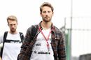 Romain Grosjean walks in the Paddock