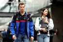 Daniil Kvyat and his girlfriend Kelly Piquet walk in the Paddock