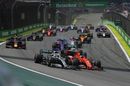 Lewis Hamilton and Sebastian Vettel battle for position