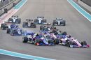 Sergio Perez battles for position with Pierre Gasly